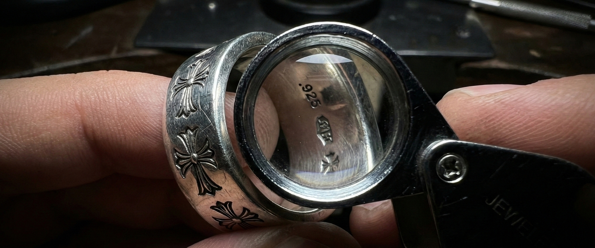Ring under magnifying glass _ loupe