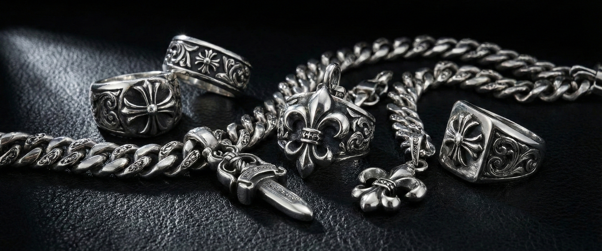 Silver jewelry collection on black leather